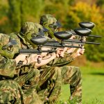 a paintball team coordinating.